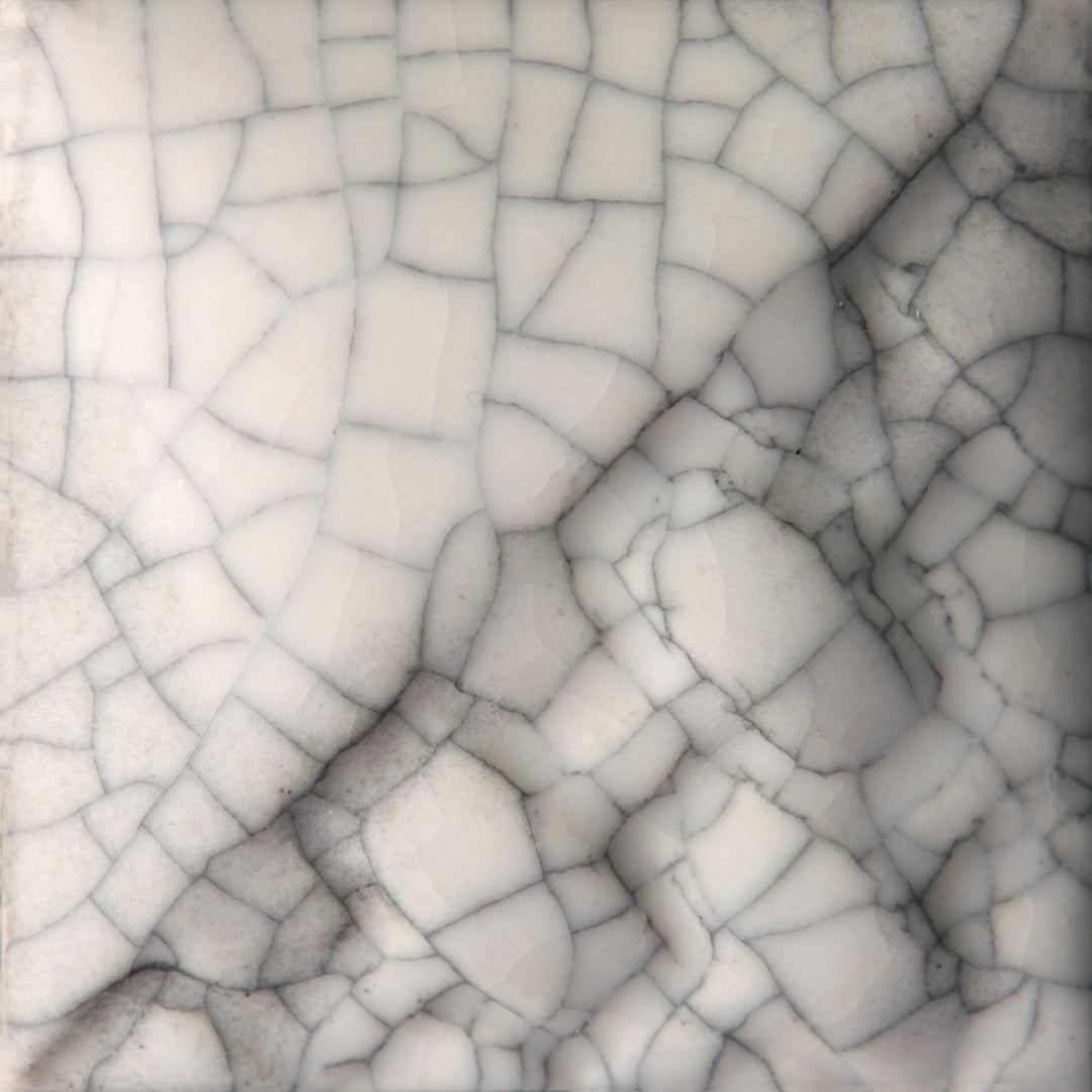 Cone 6: Soft matte, semi-transparent glaze developing a fine crackle pattern; no change at Cone 10. Amaranth Stoneware Canada.