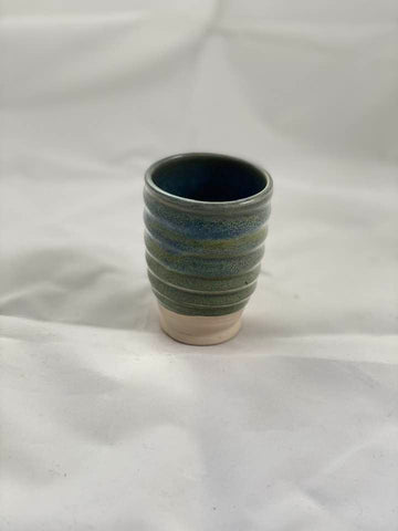 A versatile glaze category that showcases dramatic variations in appearance based on clay type, application thickness, and firing conditions; known for their runniness, requiring careful testing for optimal results.