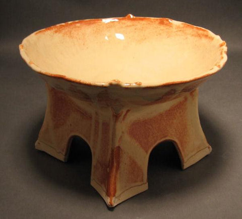 A lighter version of our Shino glaze, Light Shino is creamy beige where it pools and breaks to a darker brown over texture. Amaranth Stoneware Canada.