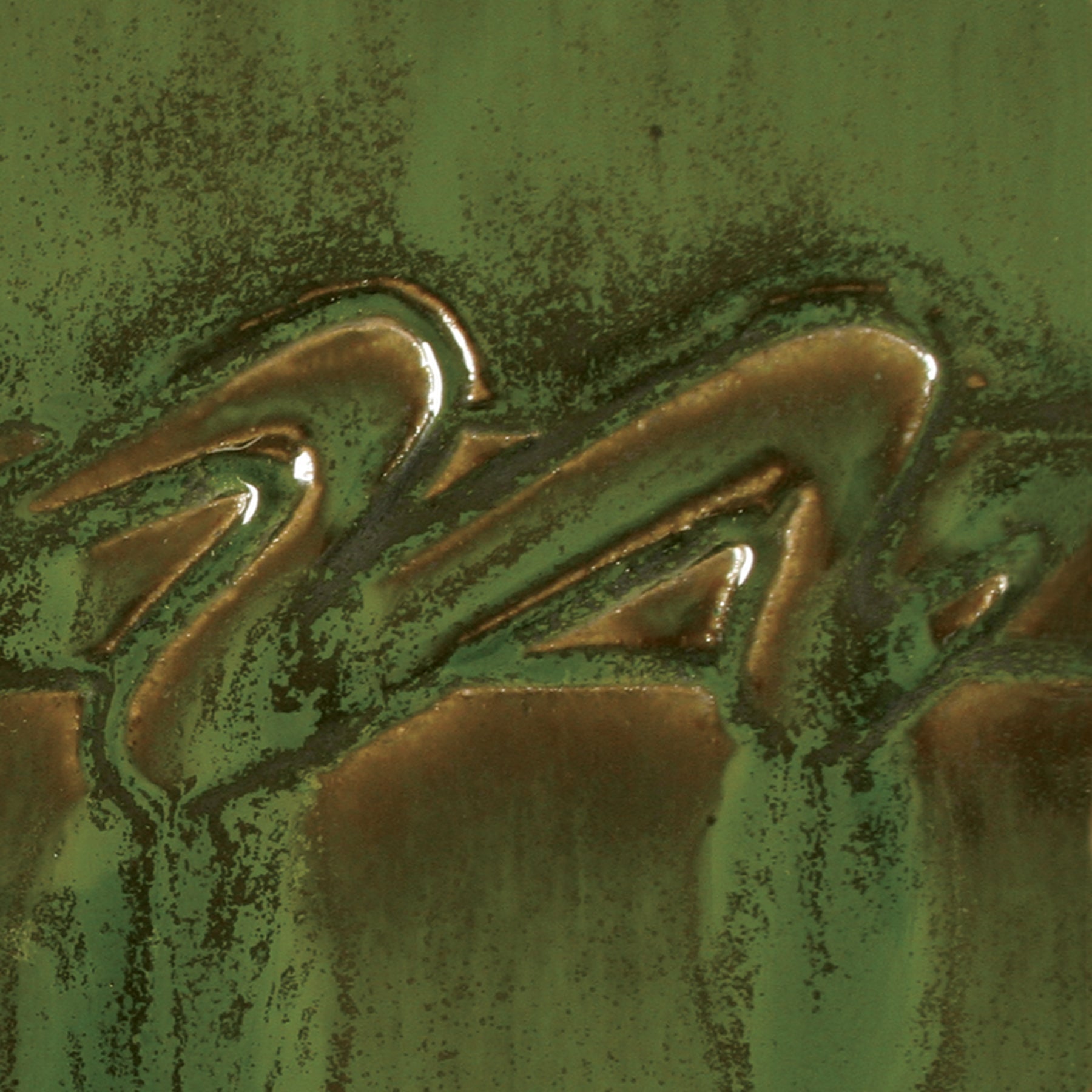 Seaweed is a fluid, deep green glaze that layers beautifully with a variety of Potter's Choice glazes. Amaranth Stoneware Canada.