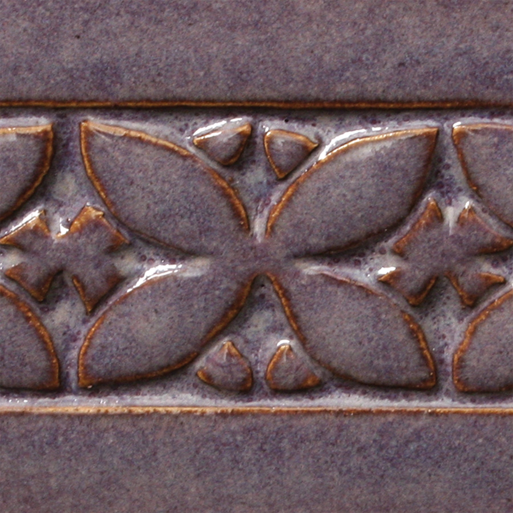 Smokey Merlot is a warm, dark purple glaze with a soft float of lilac over the surface. Amaranth Stoneware Canada.