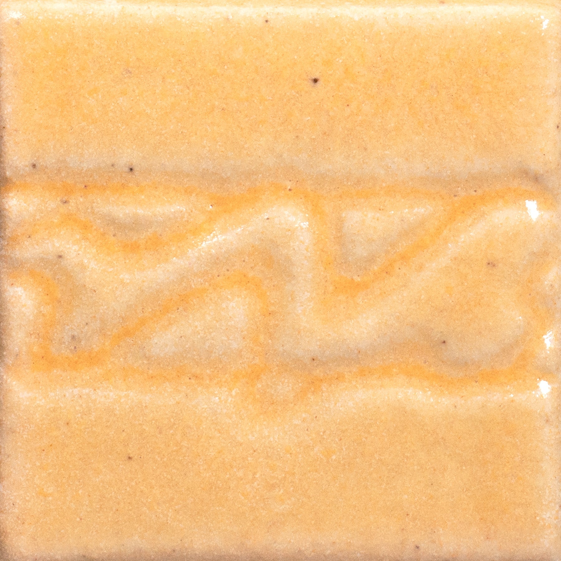 Semi-gloss warm yellow, Golden Honey is a translucent glaze like whipped honey. Breaks lighter on texture, a richer color where thick. Amaranth Stoneware Canada.