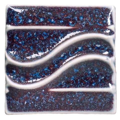 PC-72 Fire & Ice glaze, deep red when thick, icy blue when thin, dramatic textured break. Amaranth Stoneware Canada.