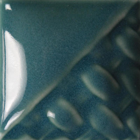 Peacock translucent teal gloss at Cone 6; one coat provides a hint of color, two to three coats deepen color while remaining translucent.
At Cone 10: Color lightens. Amaranth Stoneware Canada.