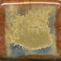 A golden cream glaze with reddish brown streaks. Can show blue crystals and varies widely in color and finish. Amaranth Stoneware Canada.