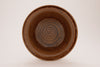 Amber glaze, a semi-transparent, glossy golden finish, appears light gold on porcelain, darker on white clay, and deep gold on red clay. Amaranth Stoneware Canada.