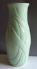 Aqua by Coyote on white porcelain. Aqua glaze, translucent blue-green similar to celadon. Amaranth Stoneware Canada.