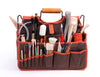 The Xiem Art Bag is a durable, breathable solution for ceramic tool storage. Features 17 pockets, 16 holsters, 2 large compartments, secure straps, and a reinforced bottom. Holds up to 25 lbs. Measures 16" x 9" x 12". Amaranth Stoneware Canada.