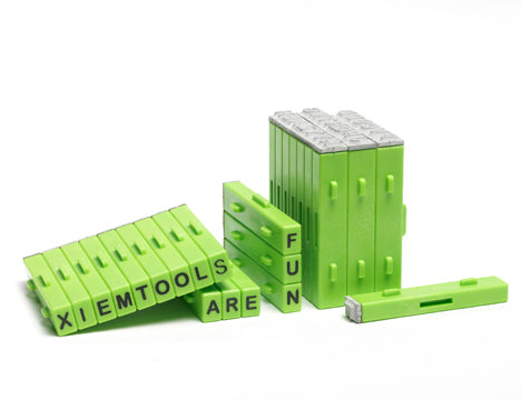 Xiem attachable lowercase letters snap together for precise, straight stamped words or phrases. Ideal for ink, paint, clay, and underglazes. Set includes 36 letters. Each stamp: 3/8