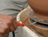 The Bat Lifter prevents broken nails, needle tools, and fettling knives. It helps potters confidently remove sticky bats or heavy wheel-throwing work from the wheel head. Amaranth Stoneware Canada.