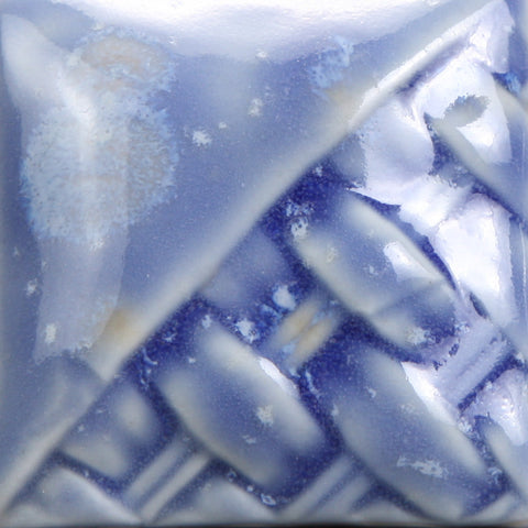 Cone 6: Floral blue glaze with yellow/white crystals; blooms appear as crystals melt, fading slightly at Cone 10. Amaranth Stoneware Canada.