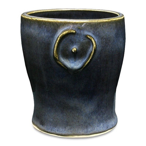 Blue Midnight is a glossy black glaze with blue highlights in thick areas, ideal for textured work and layering. Amaranth Stoneware Canada.