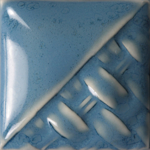 Cone 6: Medium blue semi-transparent to opaque gloss glaze. Thinner applications yield a blue haze; thicker coats are opaque. Amaranth Stoneware Canada.