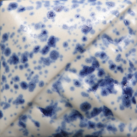 Cone 6: White semi-matte glaze with blue crystals creating blooms, resembling 19th-century enamelware; crystals fade at Cone 10. Amaranth Stoneware Canada.