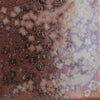 Solar Rainbow is a highly fluid, dark gloss glaze with iridescent rainbow crystals. Breaks translucent. Amaranth Stoneware Canada.