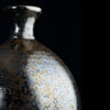 Solar Rainbow is a highly fluid, dark gloss glaze with iridescent rainbow crystals. Breaks translucent. Amaranth Stoneware Canada.