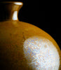Solar Flare is a glossy, opaque light brown glaze with an iridescent, crystalline texture. Fluid with slight crystal texture. Amaranth Stoneware Canada.