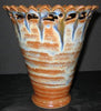 Cinnamon Stick glaze, rich glossy brown that develops a bluish haze when thick. Amaranth Stoneware Canada.