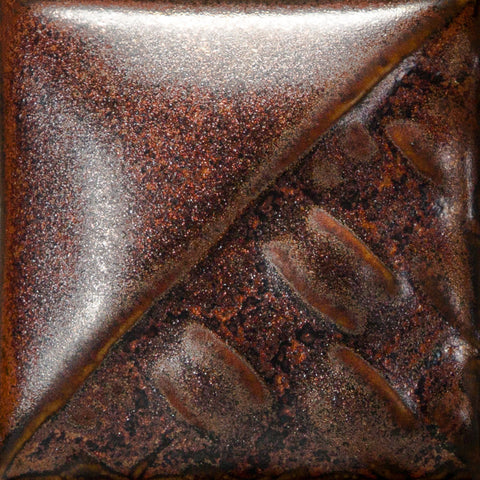 Cone 6: Fires to a metallic finish, breaking green over texture. Cone 10: Shows red variation in heavy reduction. Amaranth Stoneware Canada.