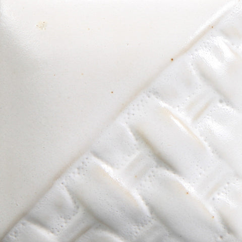 Cone 6: Bright white gloss glaze with a fine crackle pattern at Cone 6; turns orange-brown at Cone 10 without crackling. Amaranth Stoneware Canada.