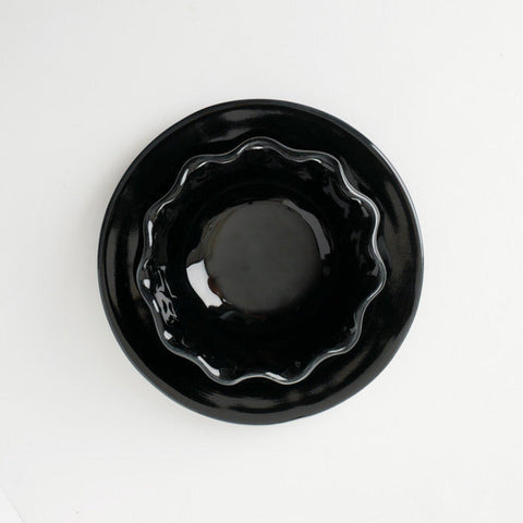 DL-1 Ebony is an opaque glossy black glaze, great as a base for layering or on its own. Amaranth Stoneware Canada.