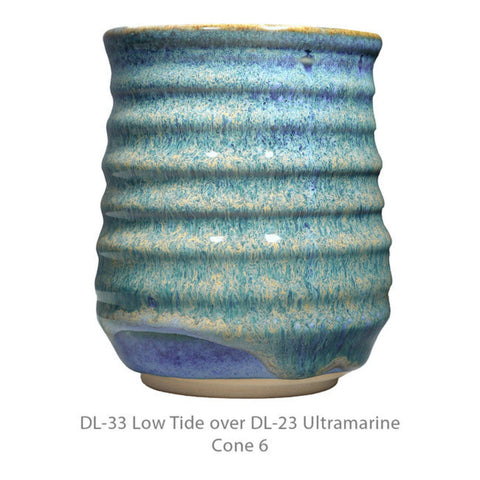 DL-23 Ultramarine is a glossy cobalt blue glaze with a lighter float. Moves when fired and breaks gray where thin. Amaranth Stoneware Canada.