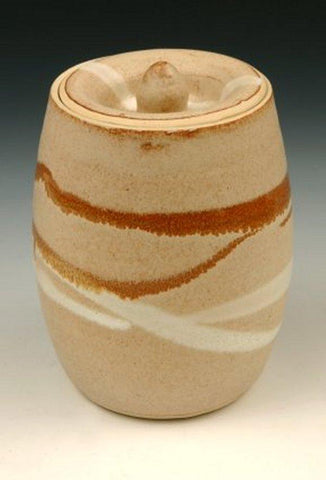 A beautiful coffee and cream glaze that breaks to dark brown when thin. Features a satiny finish, perfect for various applications. Amaranth Stoneware Canada.