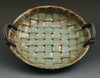 Desert Sage glaze, featuring hues that vary from sagebrush green to dark reddish-brown, ideal for enhancing a variety of ceramic works. Amaranth Stoneware Canada.
