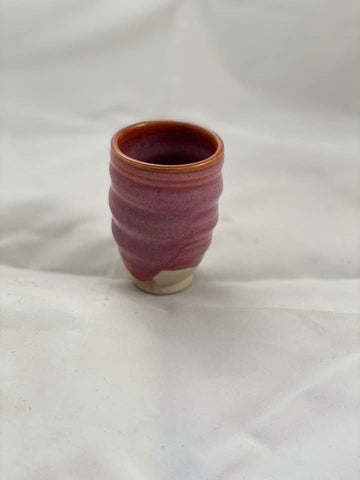 Dragon's Eye glaze, a striking example of Fantasy Glazes that showcases dramatic variation in color and texture based on application and firing. Amaranth Stoneware Canada