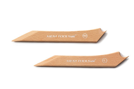 Foot Shaper: A sharp angle for cutting and a smooth concave edge for creating consistent feet. Handcrafted from beechwood, 8.5 inches. Amaranth Stoneware Canada.