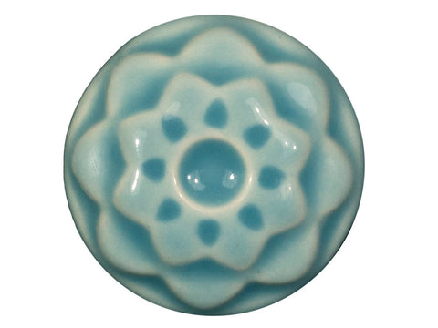Pale transparent blue-green glaze. Cone 5-6. Dinnerware Safe. Safe for Spray Application. Mixable. Amaranth Stoneware.