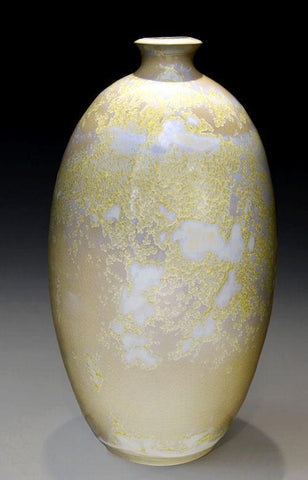 A white and transparent glaze that grows large white and gold crystals when slow-cooled. Ideal for vases. Amaranth Stoneware Canada.