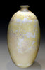 A white and transparent glaze that grows large white and gold crystals when slow-cooled. Ideal for vases. Amaranth Stoneware Canada.