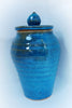 A bright electric blue glaze with slight translucency when thin, developing a deep mottled look over black. Amaranth Stoneware Canada.