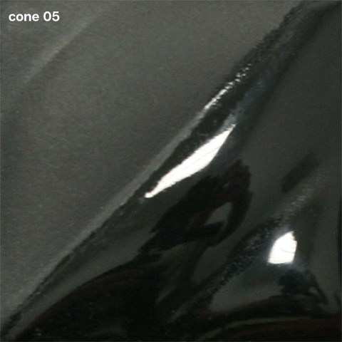 Jet Black Velvet Underglaze is a cool black, velvety at Cone 05, darker at Cone 5, and deep black with slight gloss at Cone 10. Clear glaze enhances. Amaranth Stoneware Canada.