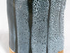 A Texas Two-Step undercoat that creates a mottled glossy black on its own. Designed for oilspot effects. Amaranth Stoneware Canada.