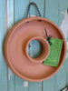 Handcrafted 7.5x2-inch Living Wreath terra cotta planter, perfect for succulents. Great drainage and ideal for indoor or outdoor decor. Handcrafted in Kingston, Ontario at Amaranth Stoneware.