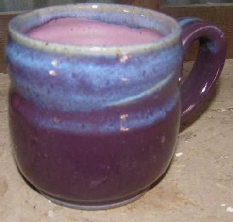 A deep, dark purple glaze that offers a solid, unbreaking finish, perfect for both decorative and practical uses. Amaranth Stoneware Canada.
