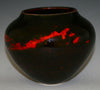 Solid black glaze, opaque with a smooth, glossy finish. Amaranth Stoneware Canada.