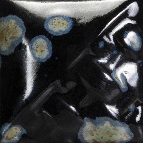 Night Moth opaque gloss glaze with crystals blooming into sage and gray at Cone 6.
At Cone 10: No change. Amaranth Stoneware Canada.