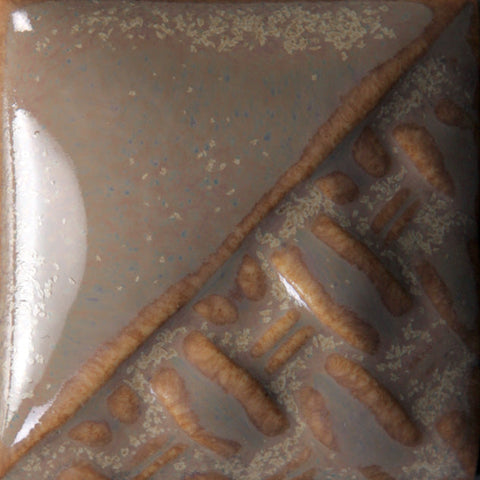 Oyster variegated cream/brown glaze with gray/purple undertones at Cone 6; breaks brown.
At Cone 10: Color changes to variegated brown/cream with increased movement. Amaranth Stoneware Canada.