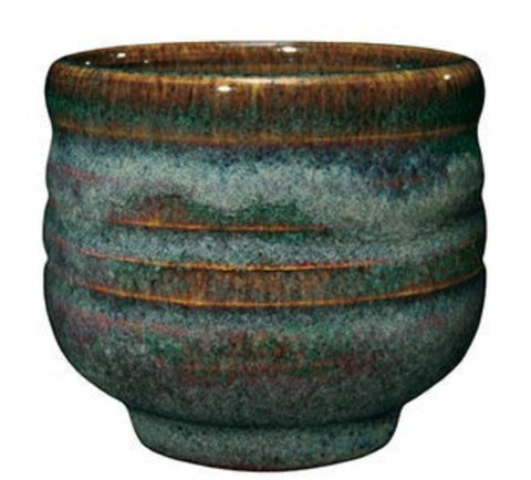 Iron Lustre is brown where thin with blue-gray floats where thick. Amaranth Stoneware Canada.