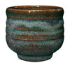 Iron Lustre is brown where thin with blue-gray floats where thick. Amaranth Stoneware Canada.