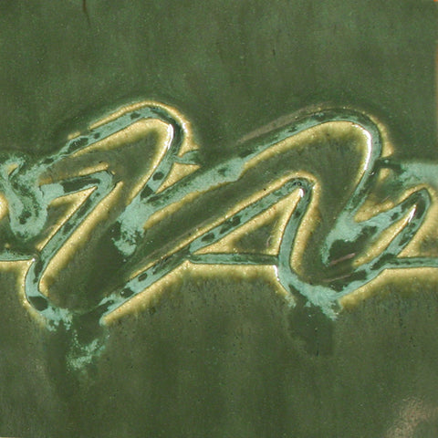 Vert Lustre is a beautiful flowing green glaze with a metallic sheen. Amaranth Stoneware Canada.