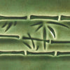 Dark green is a fluid, translucent emerald glaze that shows off textured and carved ware. Amaranth Stoneware Canada.