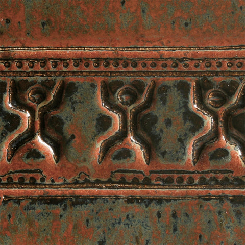 Ancient Jasper is a fluid, opaque glaze that transitions from soft black to olive green to rust red as it is applied thicker. Amaranth Stoneware Canada.