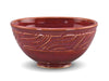 Chun Plum is a pink-red translucent glaze that breaks light tan over textures. Amaranth Stoneware Canada.