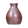 Ancient Copper is an iridescent iron red glaze that breaks dark brown over texture and pools dark yellow-green, creating a weathered look. Amaranth Stoneware Canada.