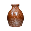 Ancient Copper is an iridescent iron red glaze that breaks dark brown over texture and pools dark yellow-green, creating a weathered look. Amaranth Stoneware Canada.