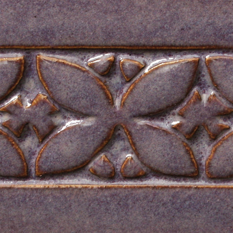 Smokey Merlot is a warm, dark purple glaze with a soft float of lilac over the surface. Amaranth Stoneware Canada.